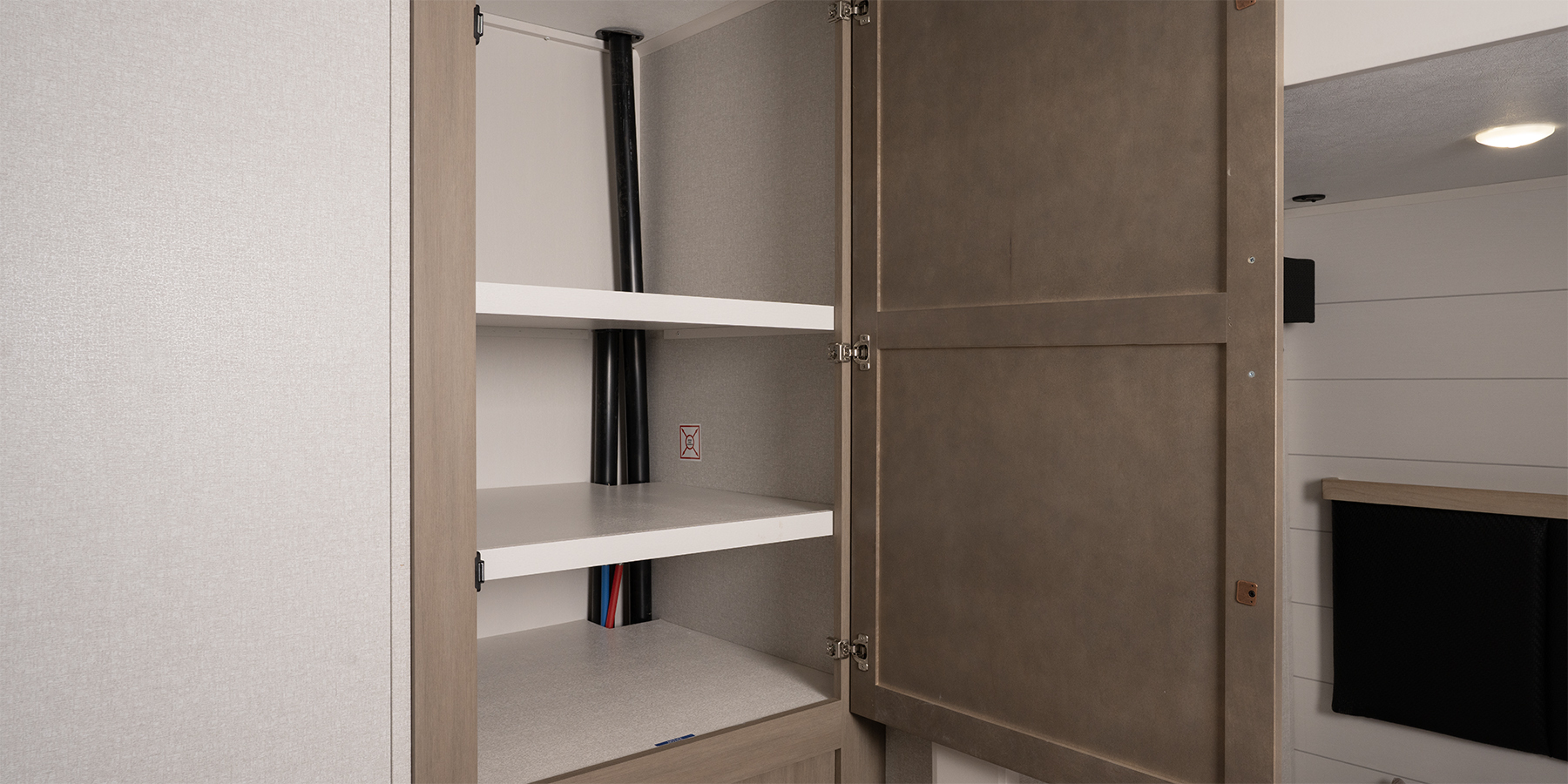 Eagle HT Travel Trailer wardrobe with adjustable shelves